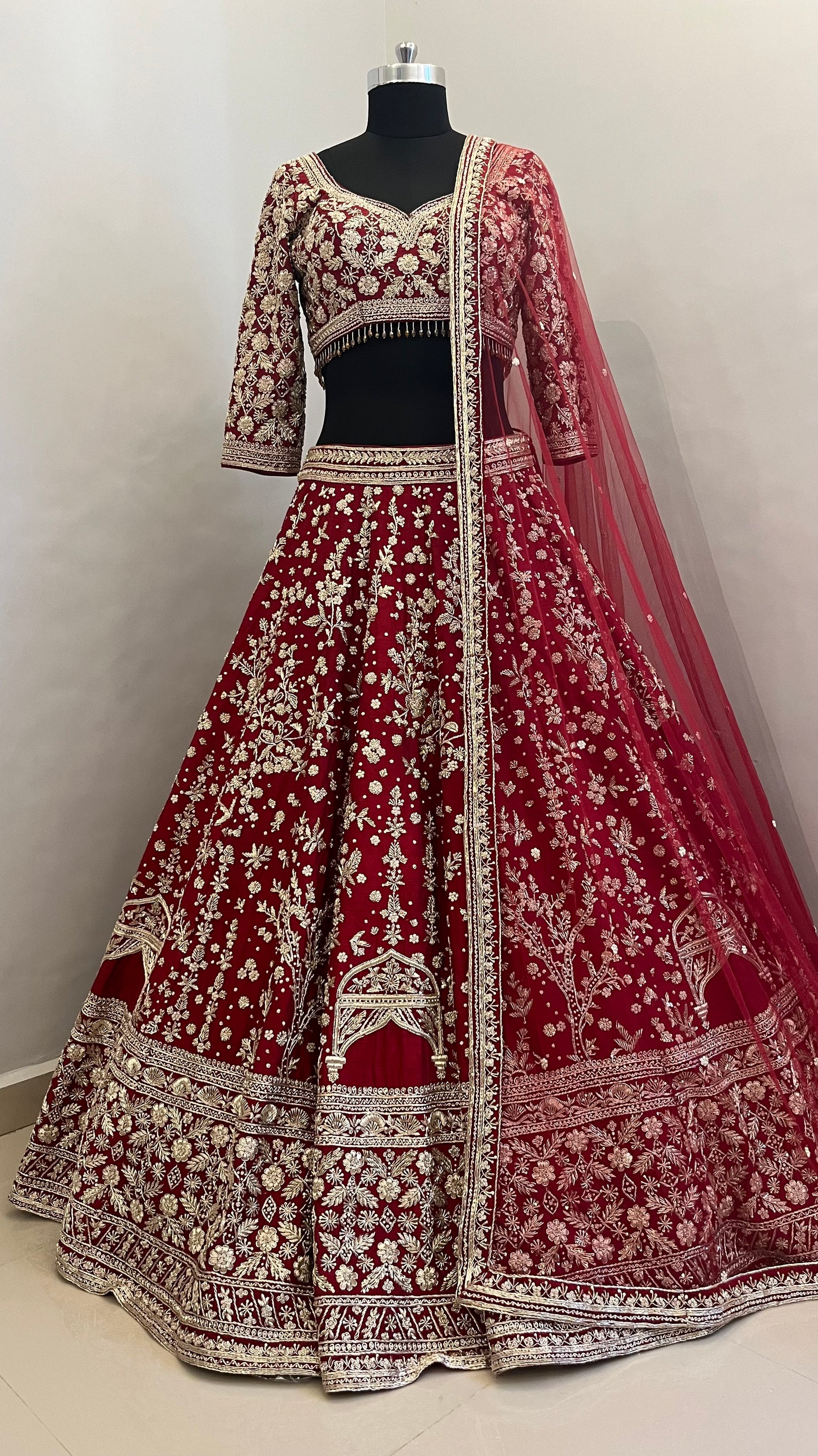 Regal Ruby Hand-Embroidered Bridal Lehenga with Mughal Arch Detailing