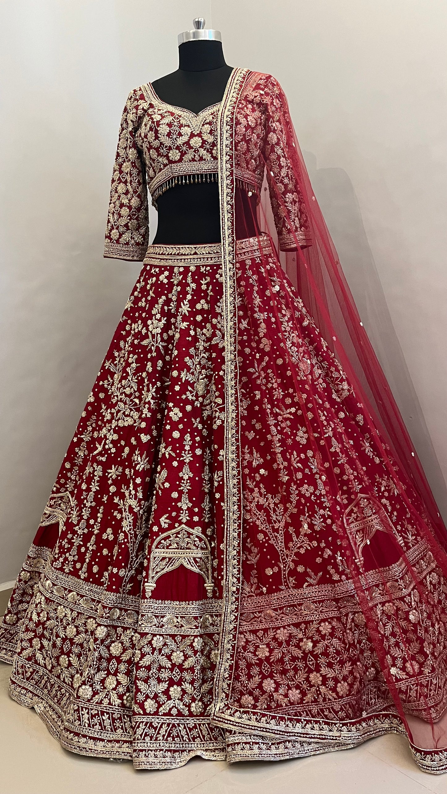 Regal Ruby Hand-Embroidered Bridal Lehenga with Mughal Arch Detailing