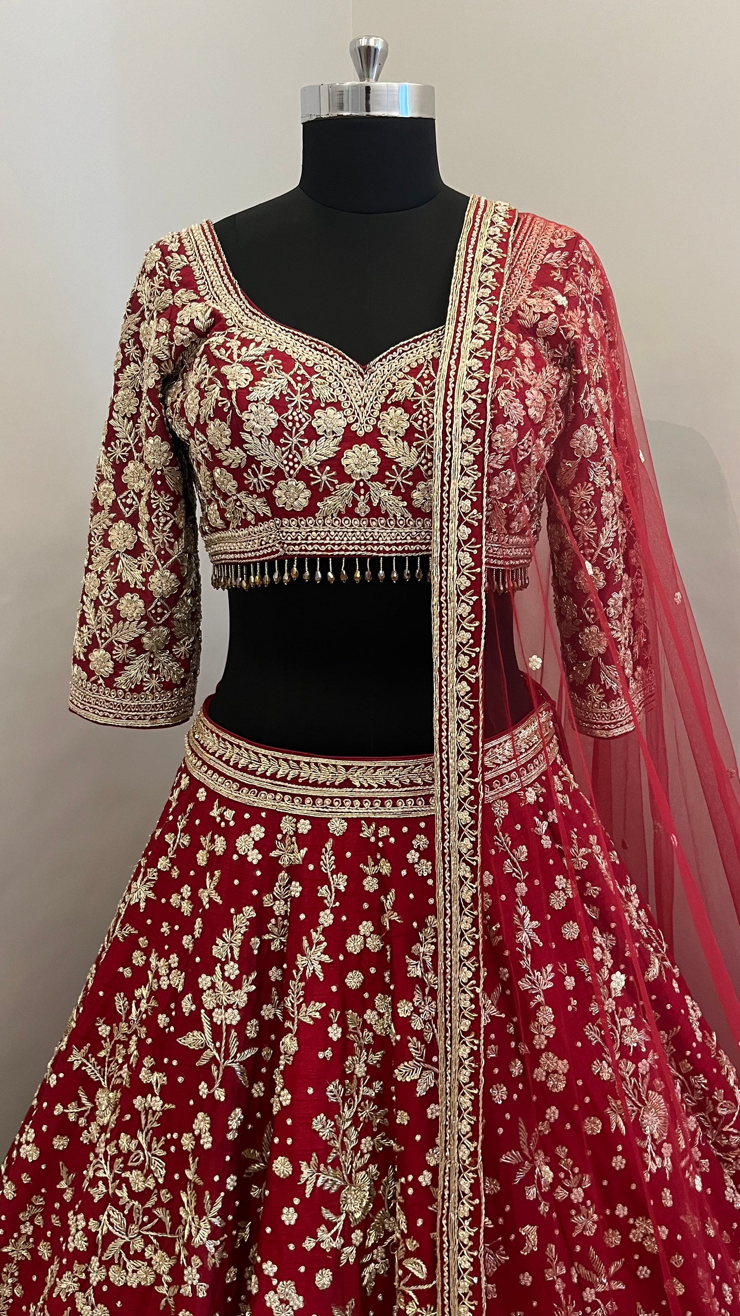 Regal Ruby Hand-Embroidered Bridal Lehenga with Mughal Arch Detailing
